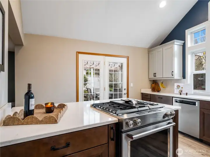 Cook with gas in the chef-style kitchen, then step outside to the deck for effortless indoor-outdoor dining