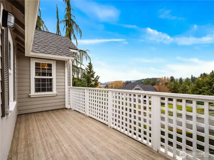 Enjoy the expanded deck off the primary bedroom—perfect for morning coffee, and relaxing evenings