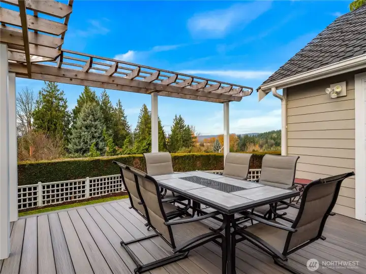 Entertain family and friends on the stunning view deck just off the kitchen, where open skies and serene surroundings set the stage for unforgettable gatherings