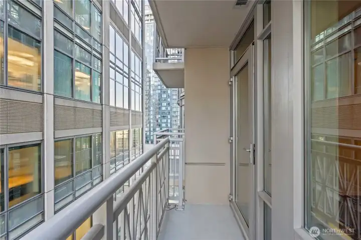 Your own covered patio has room for chairs and a bistro table to enjoy year-round!