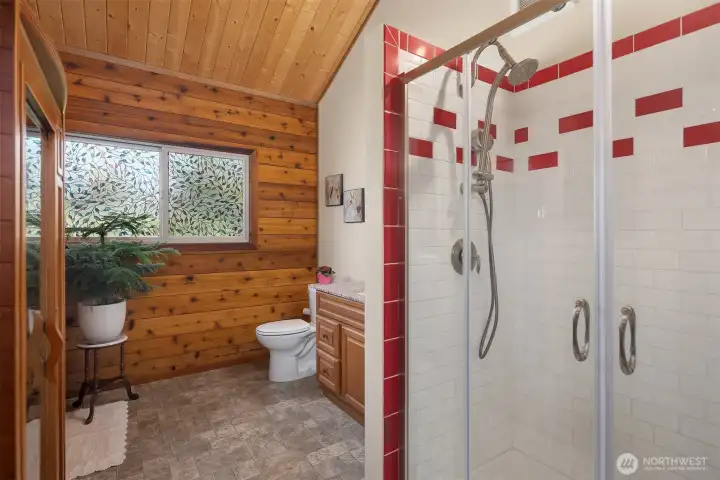 Main floor bathroom complete with shower and sauna.