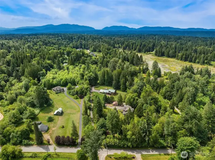 Aerial view of home, set back.
