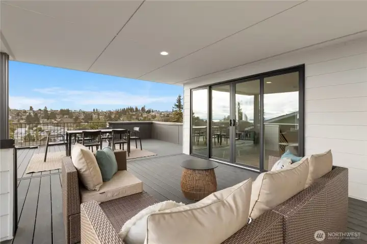 Large outdoor patio area on the 3rd level with water, city, mountain and territorial views.