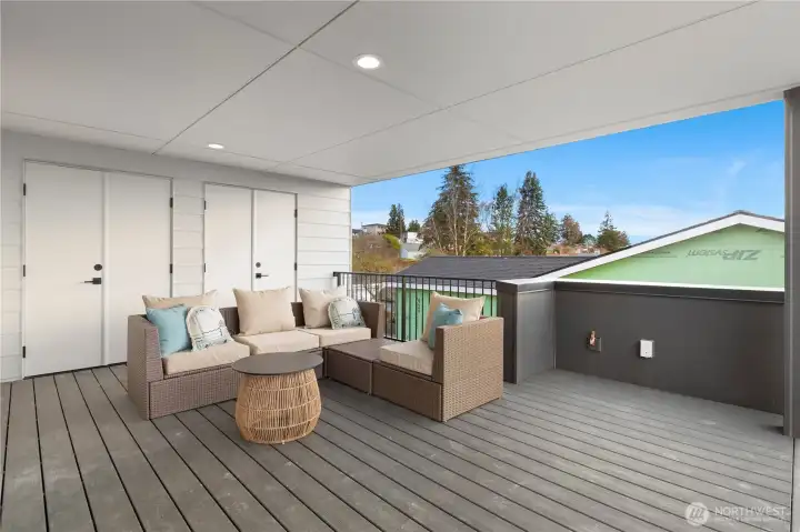 Large outdoor patio area on the 3rd level with water, city, mountain and territorial views.