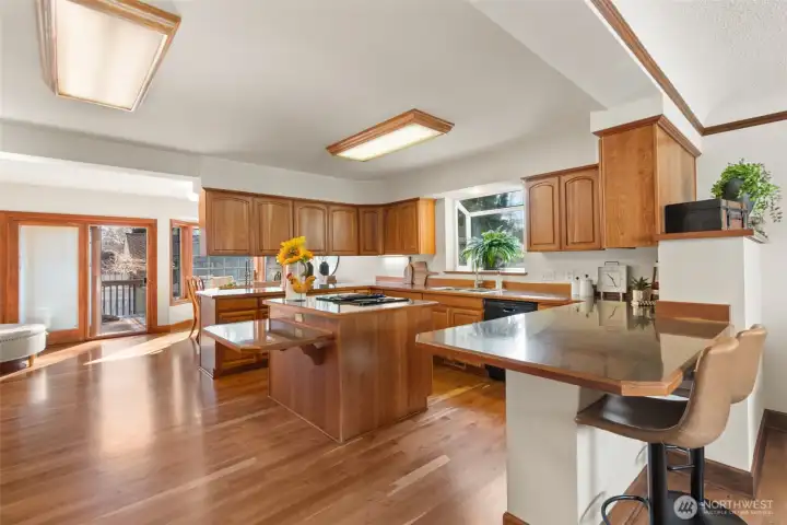 Open kitchen to formal dining & family room