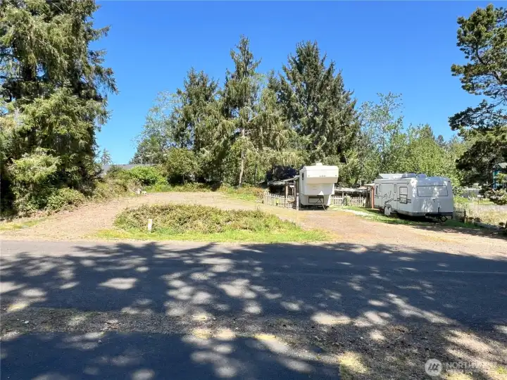 Double lot with a 3-bedroom septic, in a quiet neighborhood. All utilities and water on site.