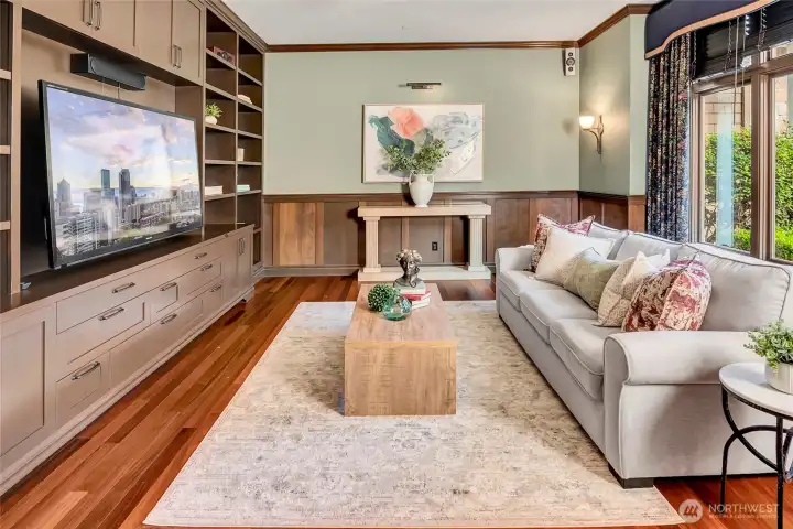 Den with 5.1 surround sound, built-ins and big screen TV.