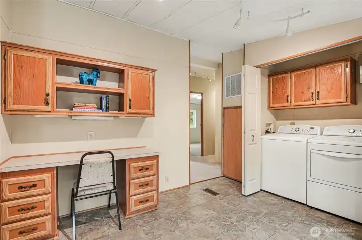 A versatile bonus space with built-in storage and laundry convenience..