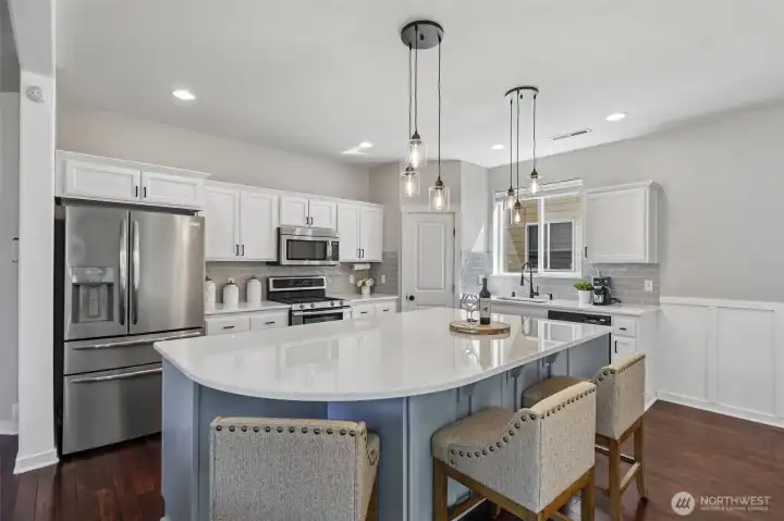 Kitchen with quartz counters & stainless appliances