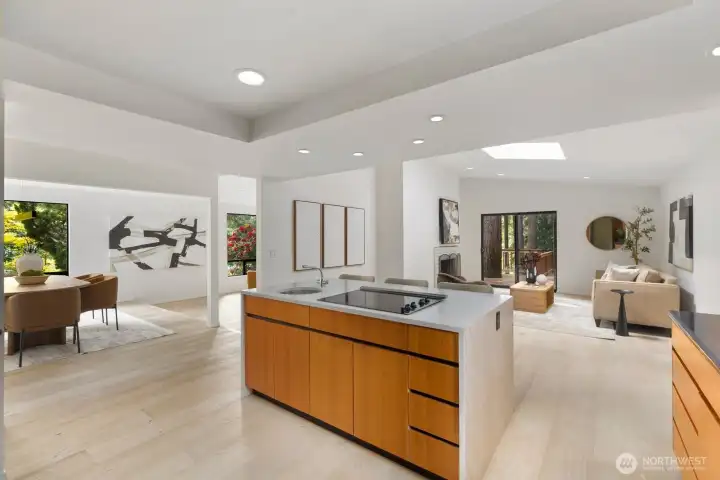 Look out from the kitchen island to see the dining and living rooms