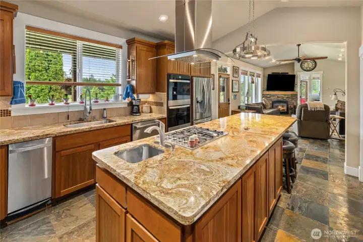 Huge island with Gas range and vegetable sink!