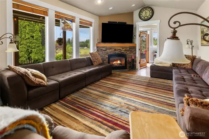 Great room w/ Vaulted ceilings with propane fireplace with additional room off the side (makes great 2nd office or hobby room).