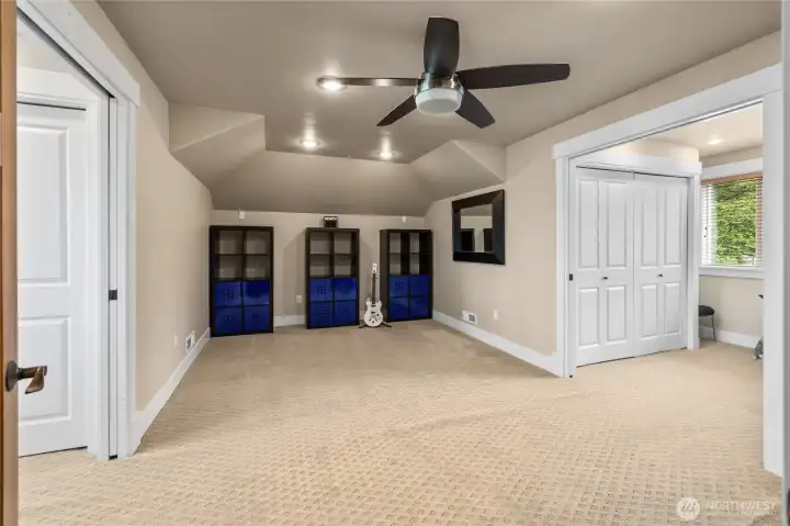 Bonus room above garage is now Game room at top of stairs with bedroom areas on each side (that's 2 rooms) with a 1/2 bath as well!