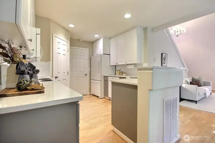 Enjoy generous counter space, ample cabinetry, and a spacious walk-in pantry that keeps everything organized and within reach. Enjoy generous counter space, ample cabinetry, and a spacious walk-in pantry that keeps everything organized and within reach.