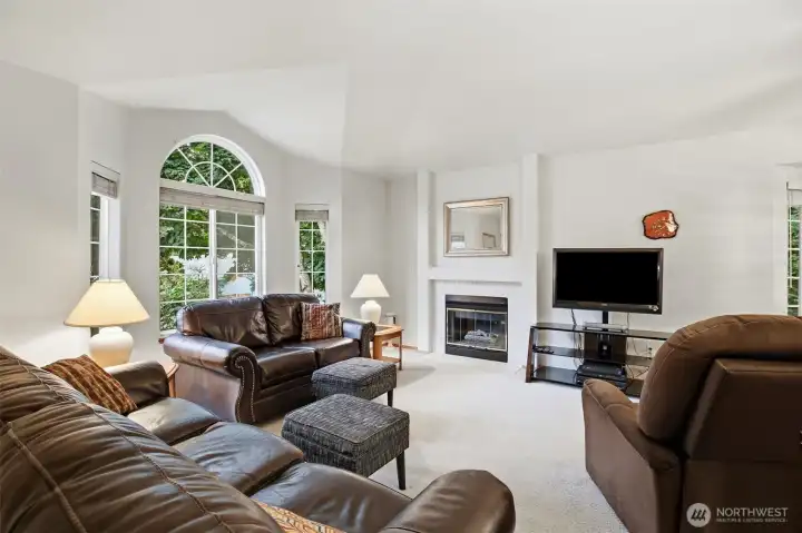 Living room also features a cozy gas fireplace, perfect for ambiance and additional warmth. Living room also features a cozy gas fireplace, perfect for ambiance and additional warmth.