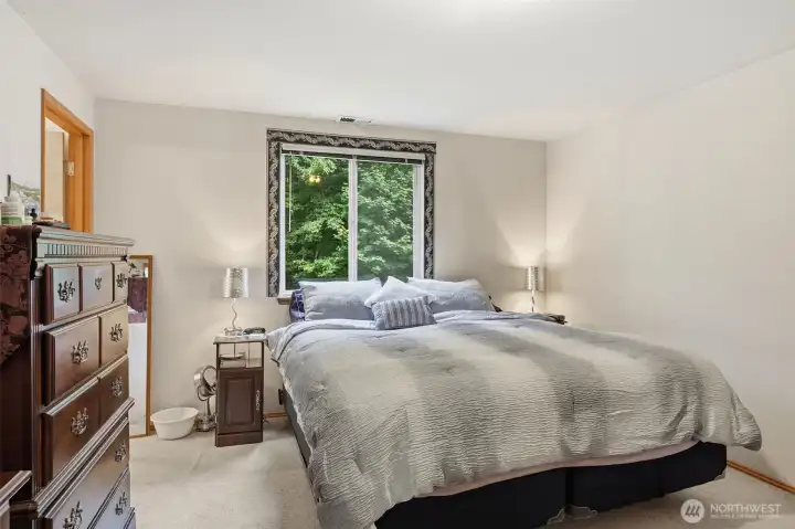This primary bedroom offers a peaceful retreat, complete with a private bathroom for added convenience and comfort. This primary bedroom offers a peaceful retreat, complete with a private bathroom for added convenience and comfort.