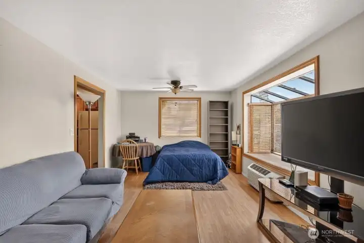 large open living room/ dining room with lots of light / bay window large open living room/ dining room with lots of light / bay window