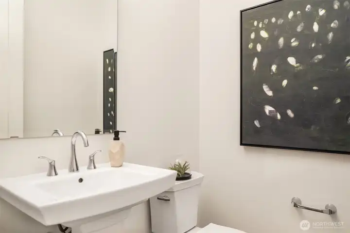 Convenient powder room on living level Convenient powder room on living level