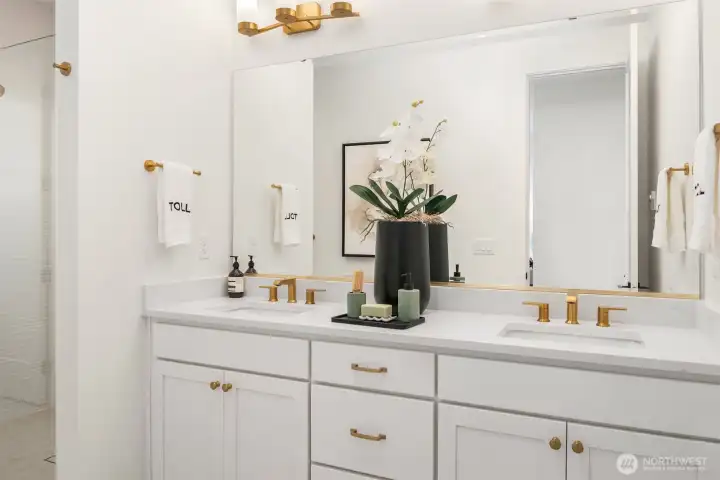 Primary bath with 3cm guartz slab countertop & 12x24 floor tile Primary bath with 3cm guartz slab countertop & 12x24 floor tile