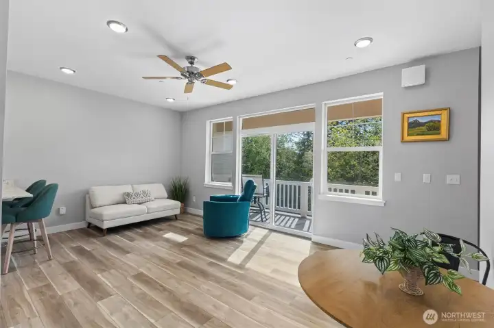 Light and bright living and dining space complete with large windows.