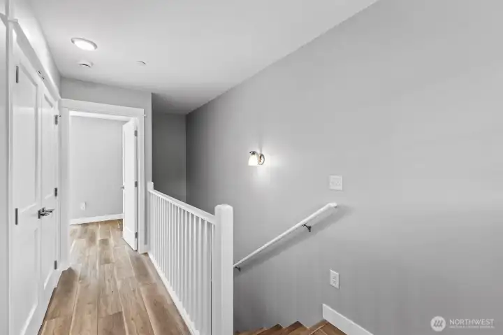 Spacious upstairs hallway, with large hall closet.