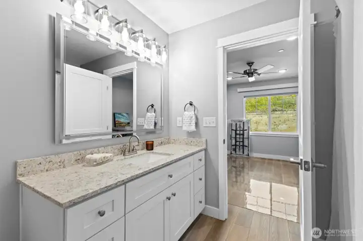 Ensuite full bathroom complete with plenty of storage.