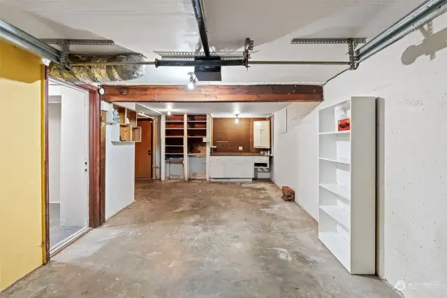 Attached garage with built in workspace.