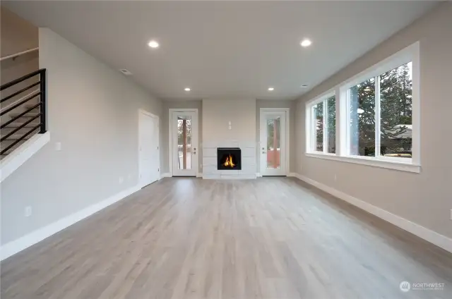 Gas fireplace, deck access and large open space that is ready for all of your entertaining needs