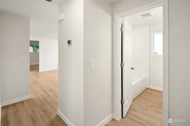 Hallway view of Living & Main Bath