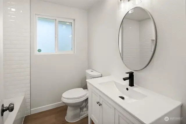 Main Bath completely renovated with brand new vanity, sink faucet & toilet