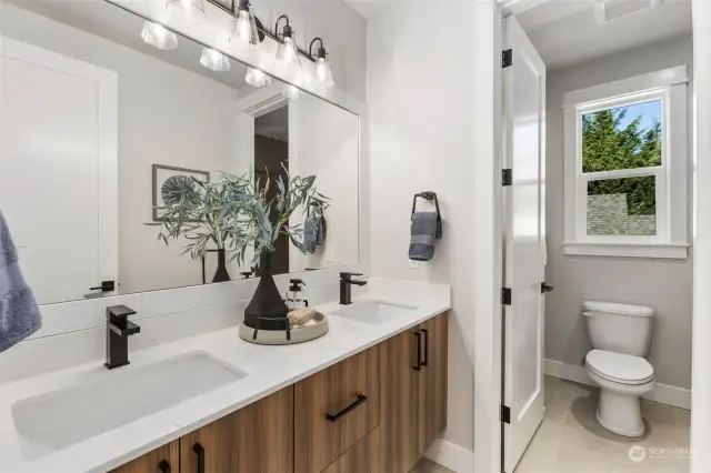 Upper guest bathroom vanity with double sink