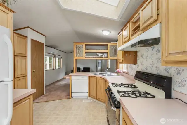 Full size kitchen with lots of cabinets.