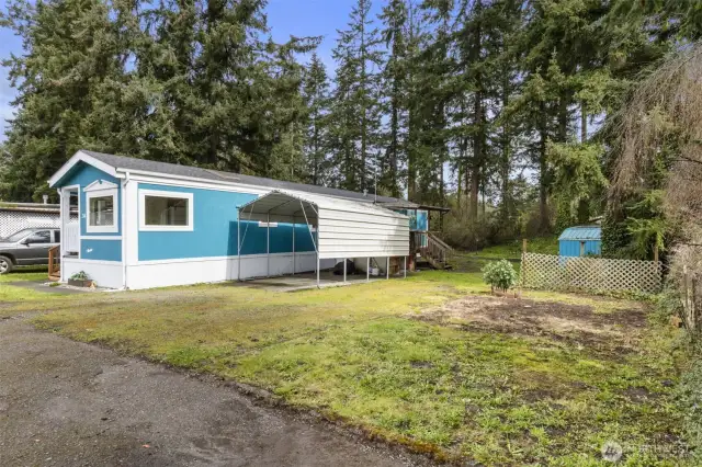 Larger 7,000 sqft lot with carport.