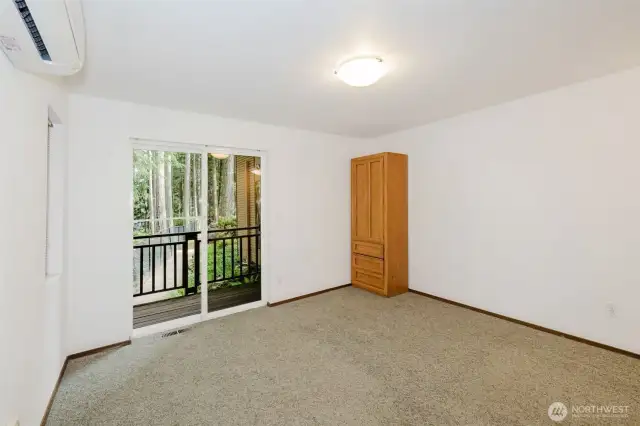 A different view of the same bedroom... imagine spending quiet moments in solitude on your own porch!