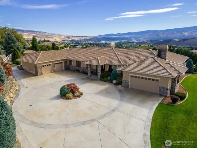 Elegant and efficient - grand circular drive with 2 separate 2-car garages