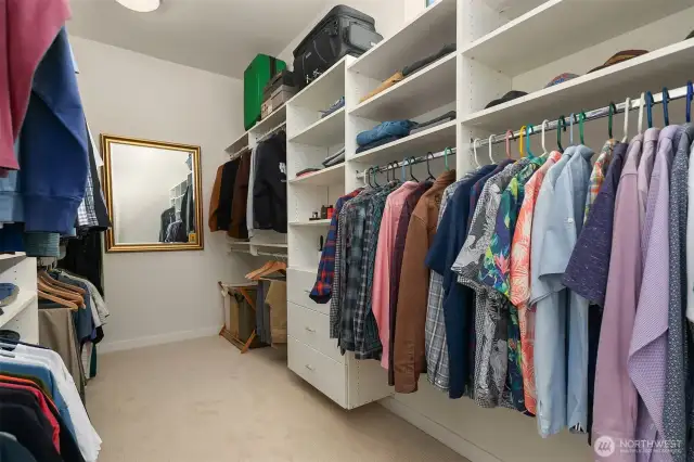 Spacious Primary closet to hold all your clothes and then some.