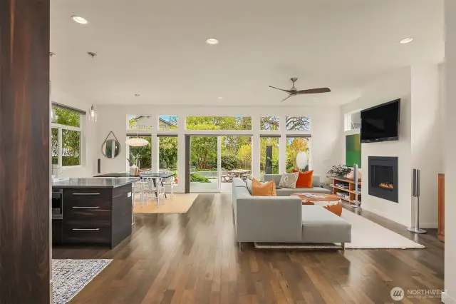 10ft. ceiling height and oversized windows on both floors allow natural light to brighten the interior spaces.  Home and gardens are knitted together seamlessly in their existence making for a true indoor/outdoor lifestyle.