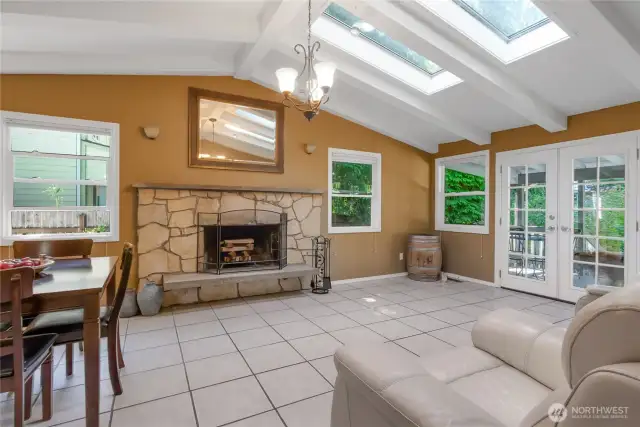 Better view of family room. The two skylights provide so much extra light. The French doors lead to your private double deck and hot tub!