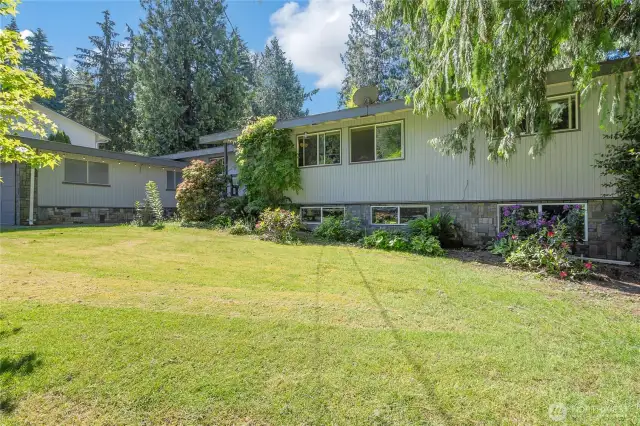 Lush greenery and mature landscaping. Rambler with basement and plenty of storage!