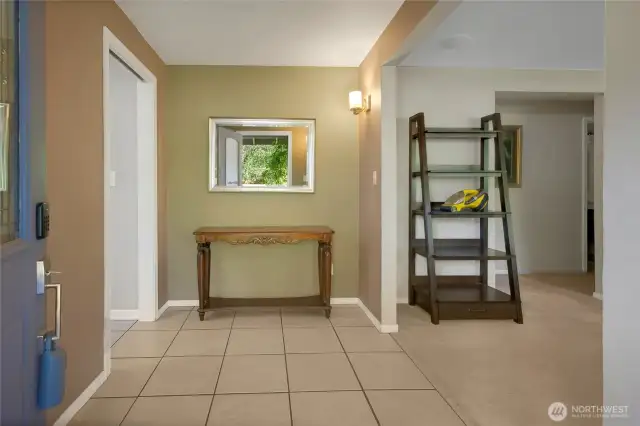 As you enter the home, real tile flooring in the entry and to the left, cushy carpet to your private living room.