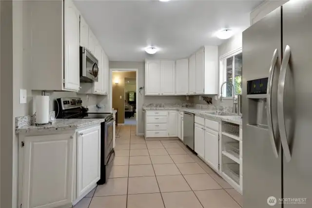 Stainless steel appliances, granite counters, very nice.