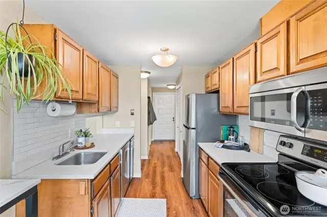 Kitchen with Stainless Steel Appliances - Brand New Refrigerator
