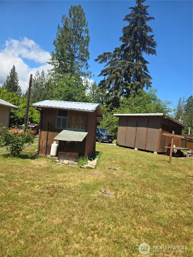 This shed houses the full bath
