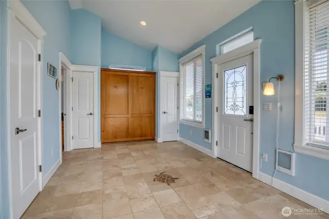 Entering the home, you will find ample storage, and the murphy bed on the east wall.