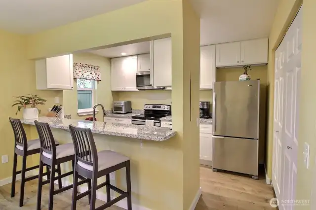 Gorgeous kitchen with granite countertops & functional layout, perfect for everyday cooking.