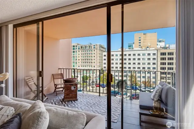 Floor to ceiling windows and sliding door that open to spacious balcony!