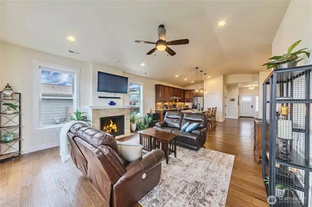 Main level great room showing living, kitchen that leads to dining