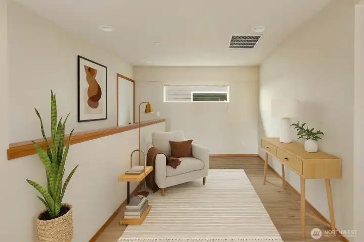 Flexible loft at the top of the stairs provides several options! Photo has been virtually staged.