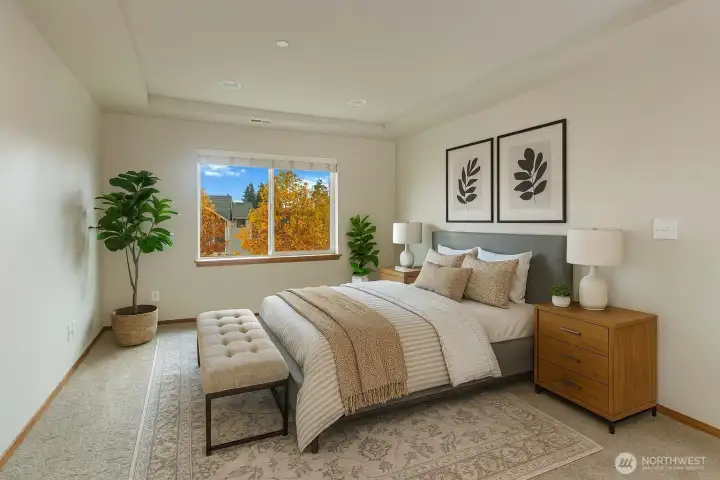 Spacious primary suite with bright, dual sink, bath, and spacious walk-in closet. Photo has been virtually staged.