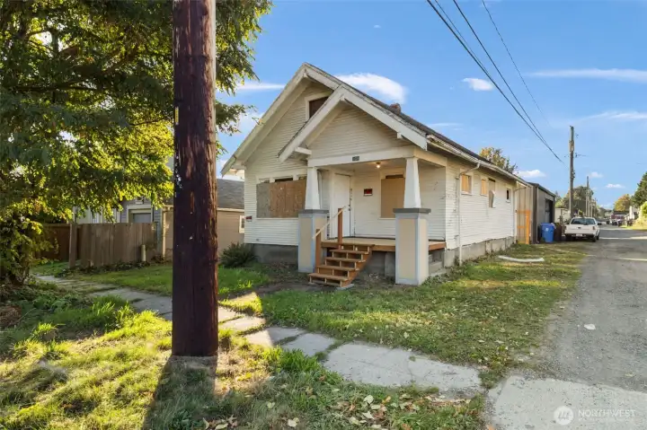 Rehab started, ready for your finishing touch! Classic 1925 two-bedroom in Tacoma’s Lincoln District.